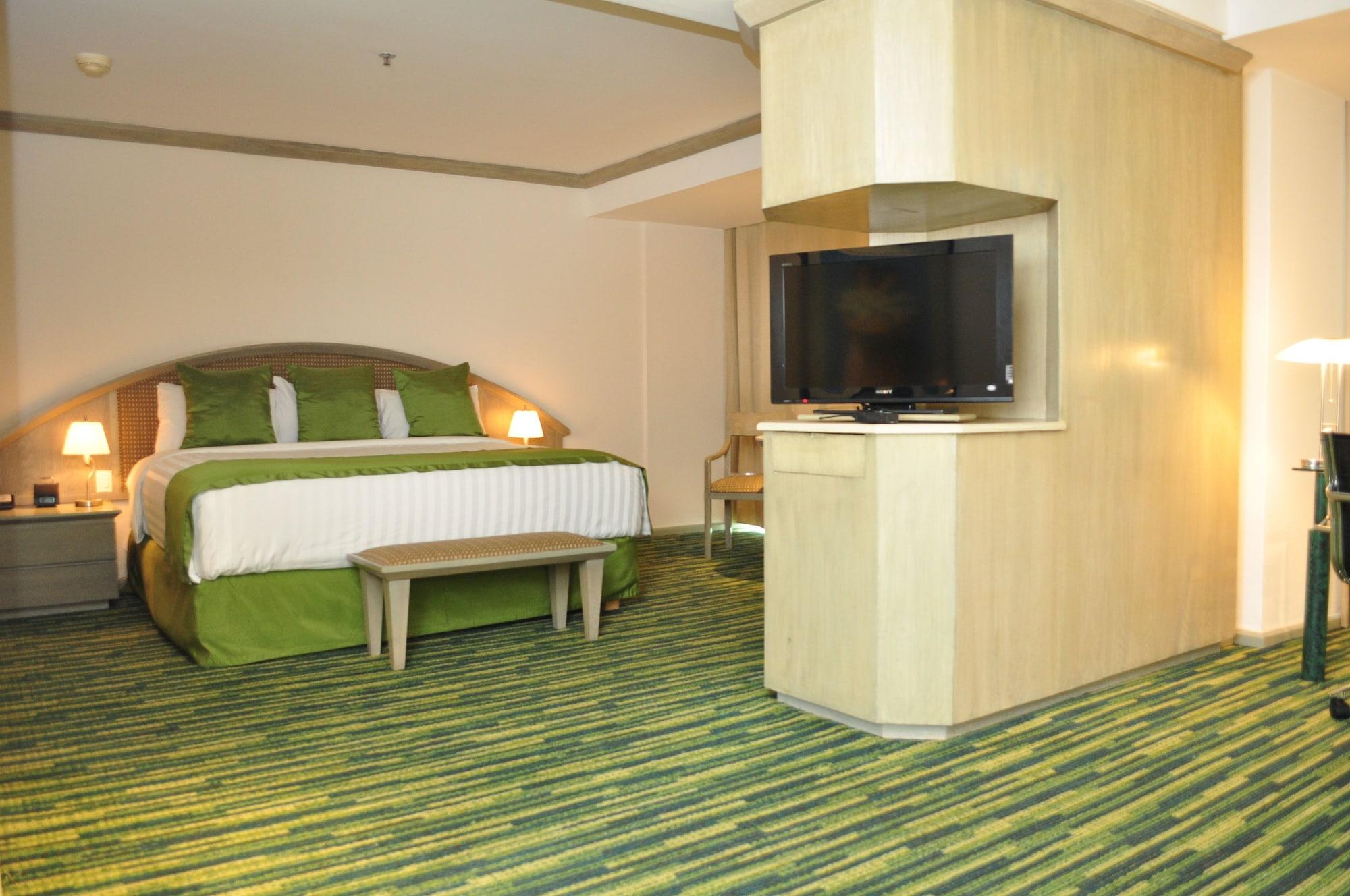 Radisson Paraiso Hotel Мехико Экстерьер фото A room at the hotel